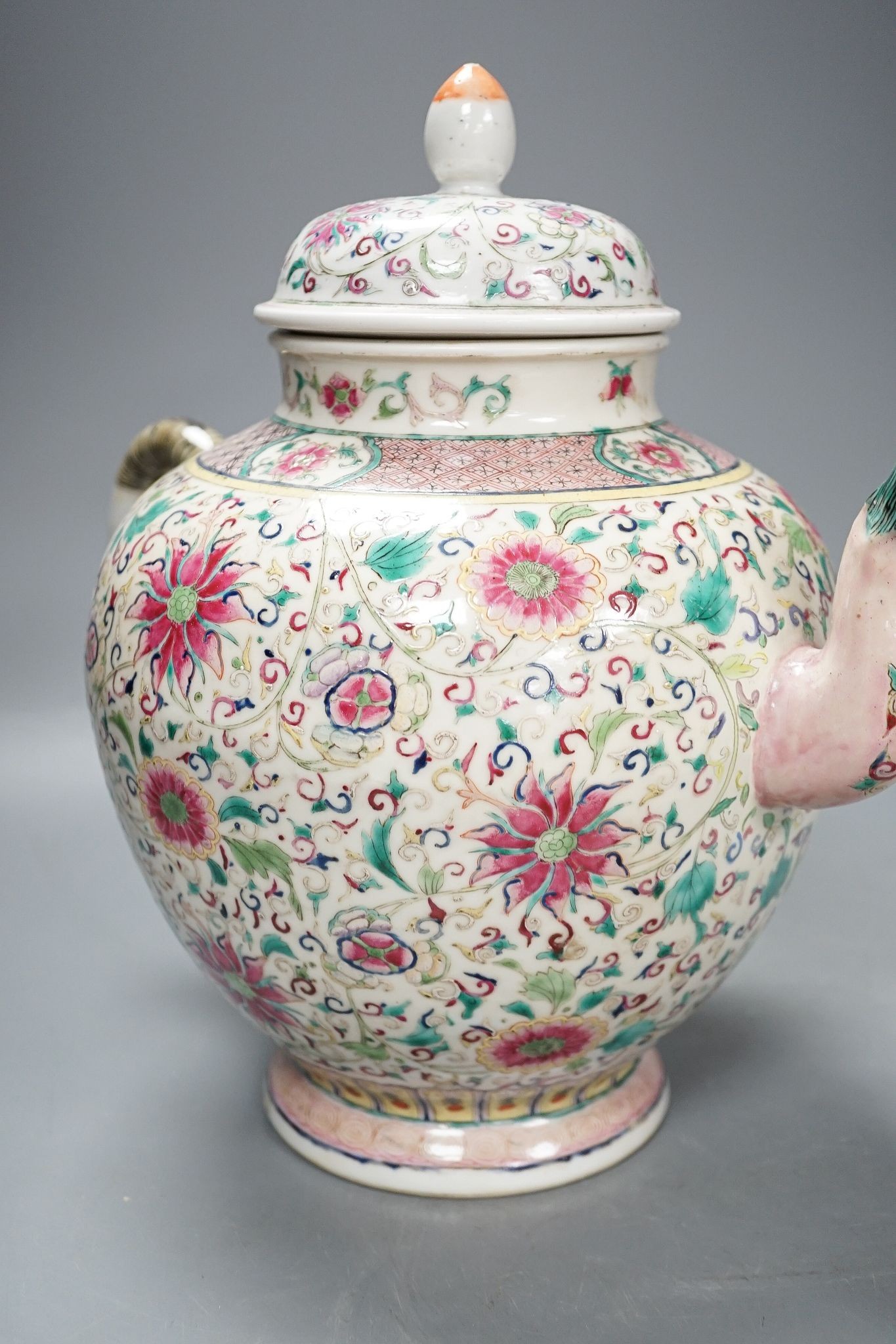 A large 19th century Chinese famille rose wine pot, and another wine pot, tallest 27cm